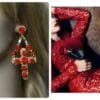 A woman in red is wearing earrings and a dress