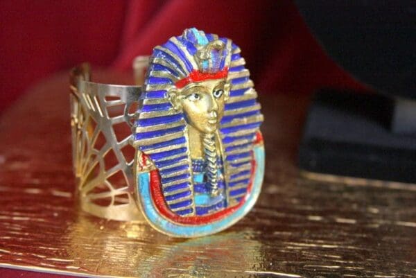 A close up of an egyptian themed ring