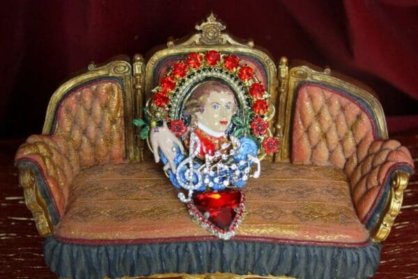 A close up of a chair with a picture on the back