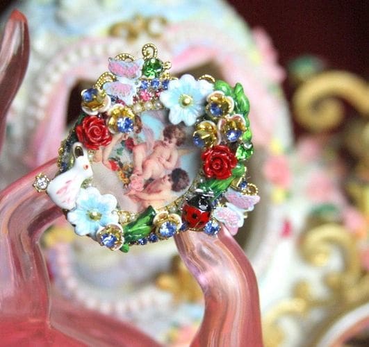 A close up of a person holding a wreath