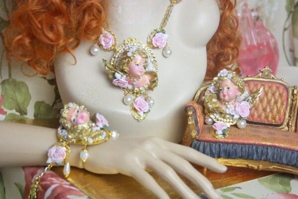 A woman 's hand is shown with jewelry on it.