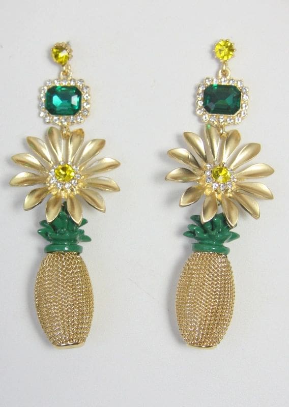 A pair of gold earrings with green stones and a pineapple.
