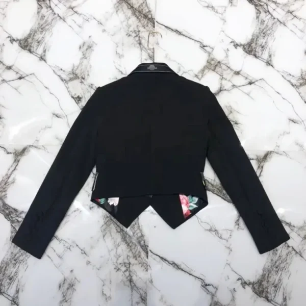 A black jacket with two buttons on the front.