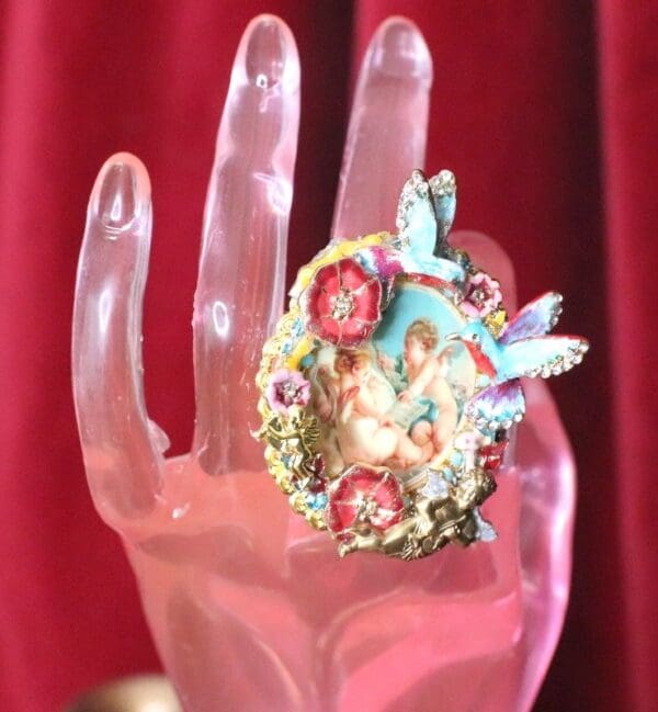 A hand with a ring on it's finger