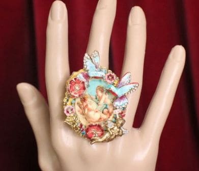 A hand with a ring on it's finger