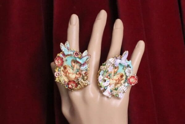 A hand with two rings on it