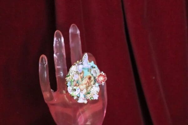 A hand with some kind of object on it
