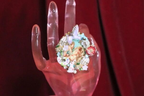 A hand with many different items on it