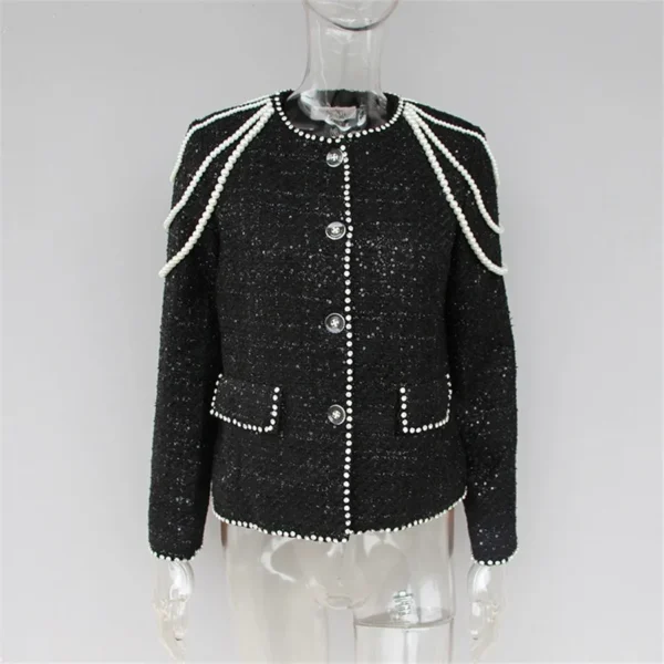 A black jacket with white trim and buttons.