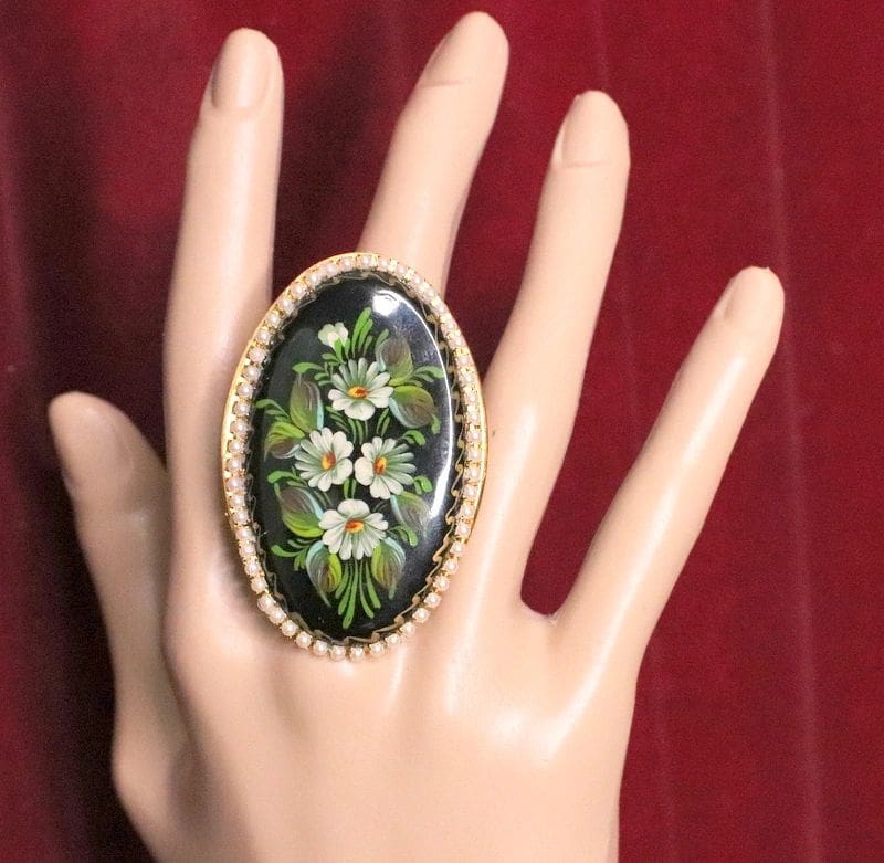 A hand with a ring on it's finger