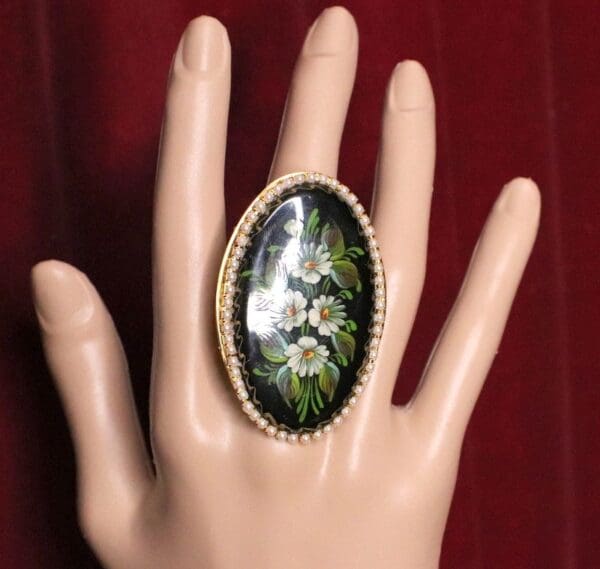 A hand with a ring on it's finger