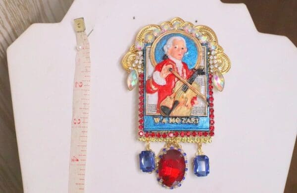 A picture of the king of siam on a wall.