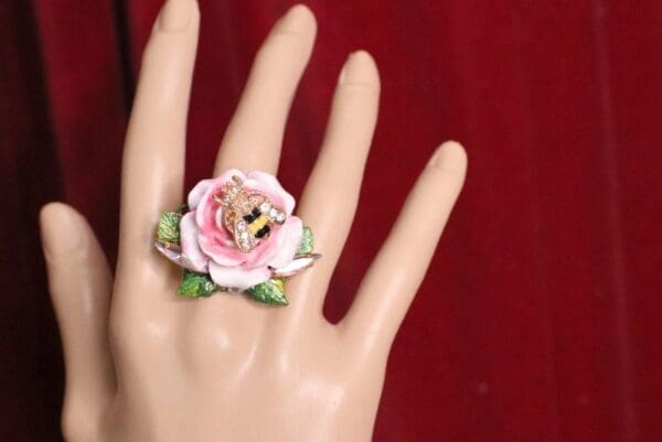 A hand with a ring on it's finger