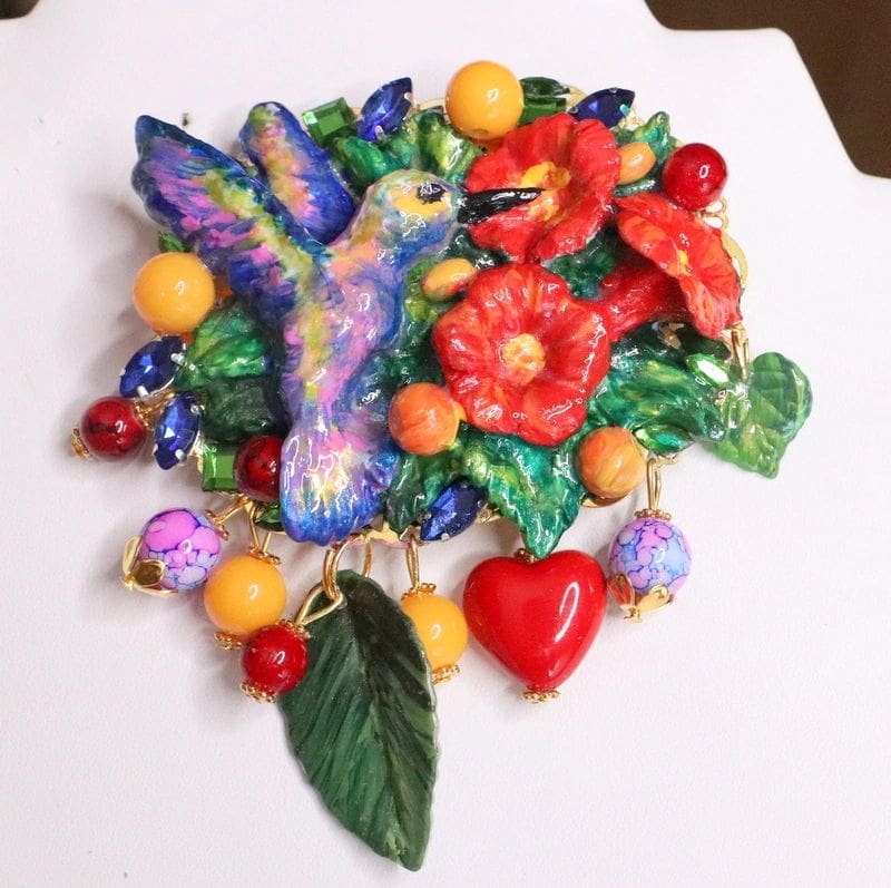 A bunch of colorful beads and flowers on a table