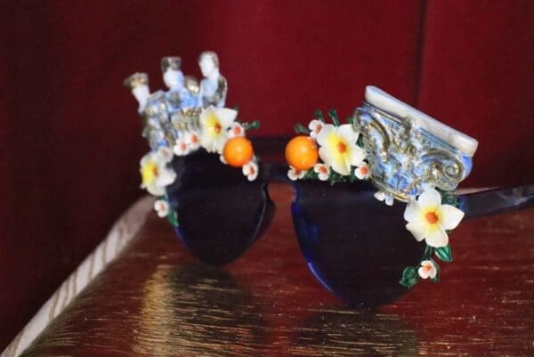 A pair of shoes with flowers on them