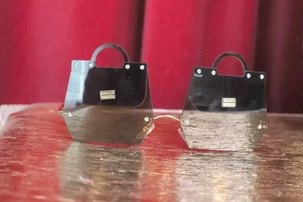 Two bags are sitting on a table