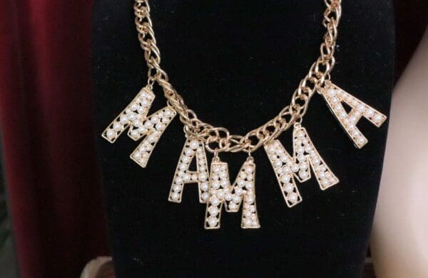 A necklace with the letters of the alphabet on it.