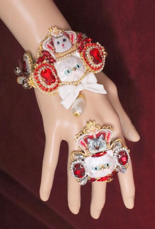 A hand with some jewelry on it