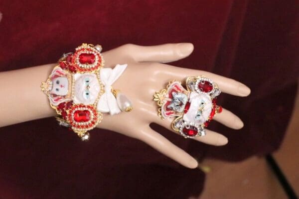 A hand with two different rings on it
