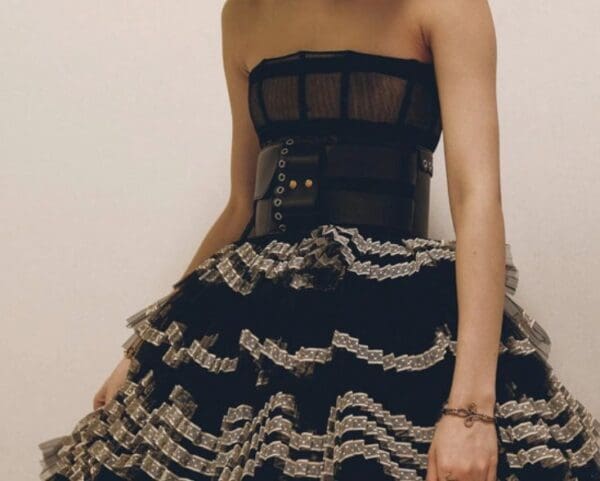 A woman in a black and white dress