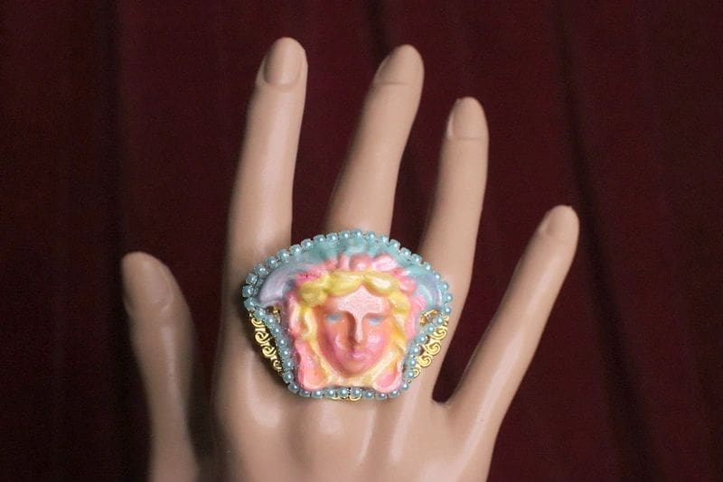 A hand with a ring on it's finger