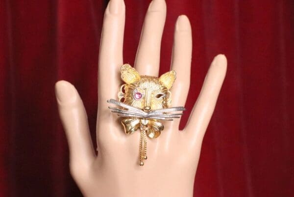 A hand with a ring on it's finger