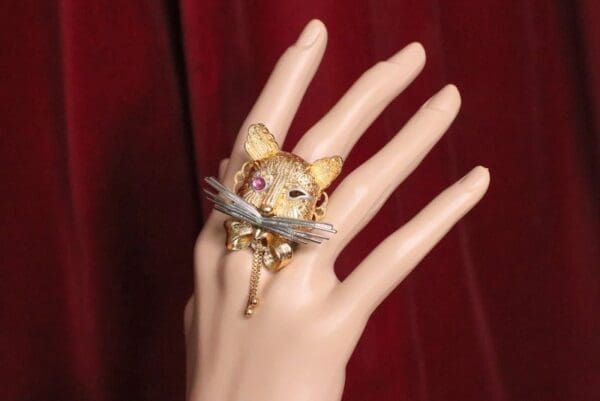 A hand with a ring on it's finger