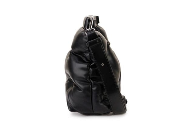 A black bag is shown with a strap.