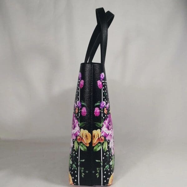 A black bag with flowers on it