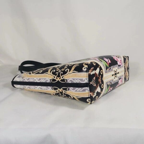 A close up of the side of a purse