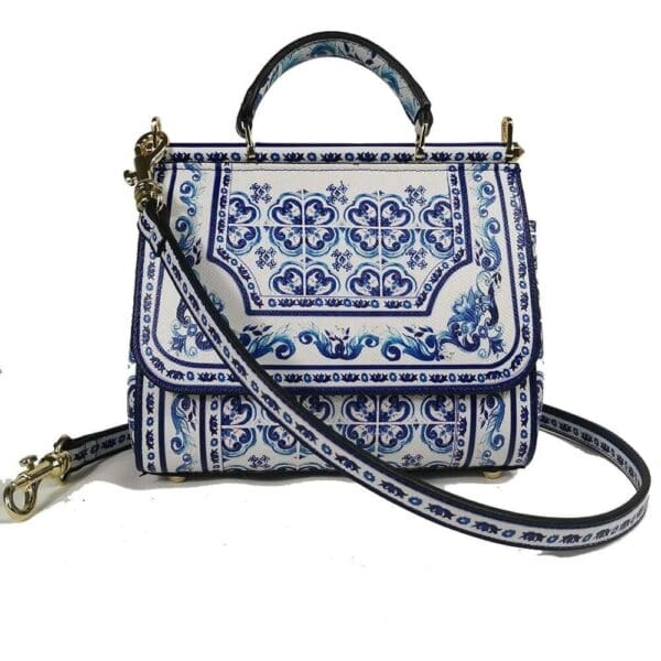 A blue and white purse with a strap
