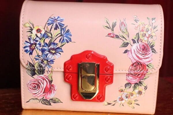 A close up of the front of a purse