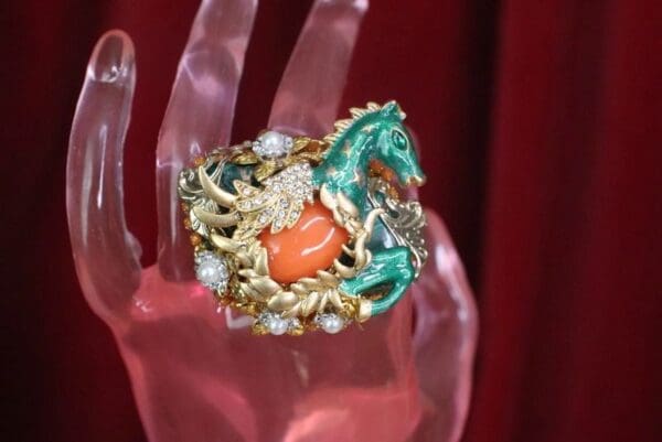 A close up of a ring on someones hand
