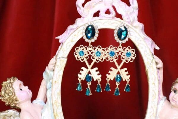 A mirror with some earrings hanging in it