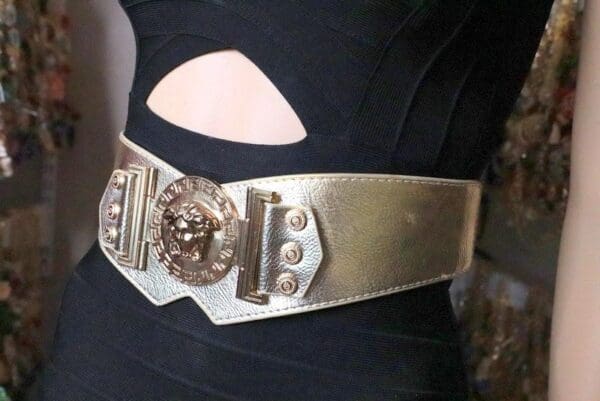 A close up of the belt on a woman 's waist