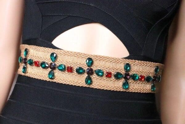 A close up of the cross on the belt