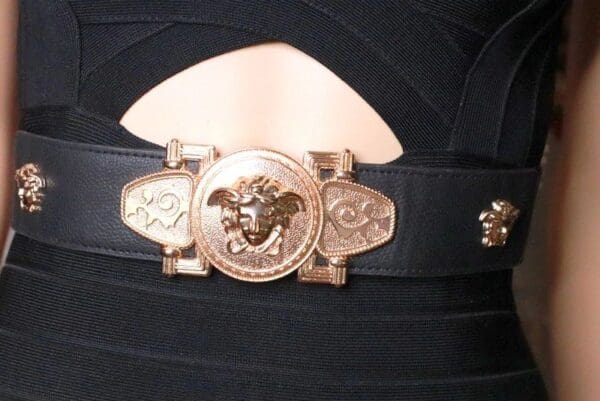 A close up of the buckle on a belt