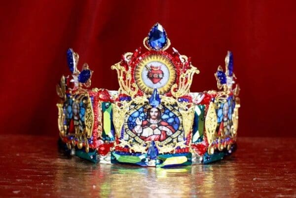 A colorful crown is sitting on the floor.
