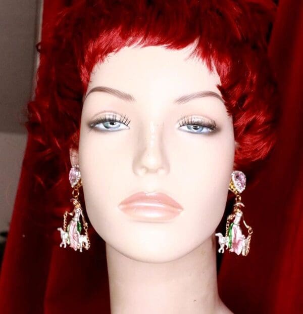 A mannequin with red hair and white earrings.