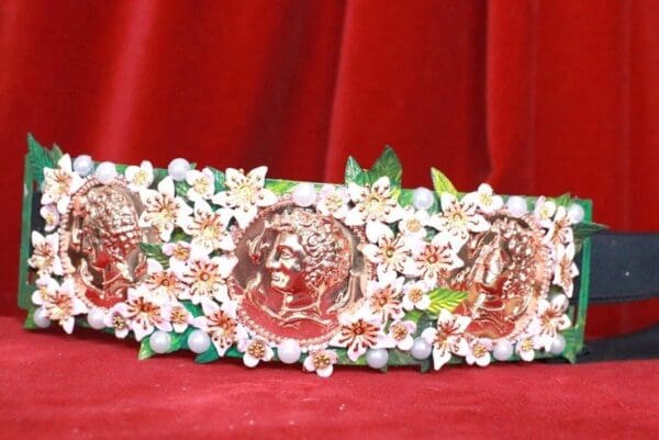 A close up of the front of a tiara