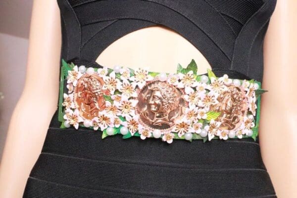 A close up of the waist band of a dress