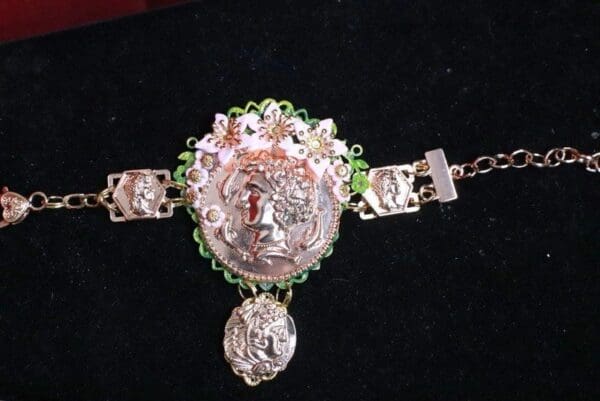A close up of the bracelet on someones wrist