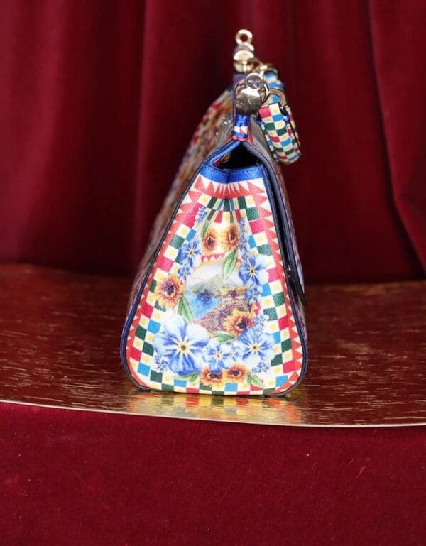 A close up of the top of a purse