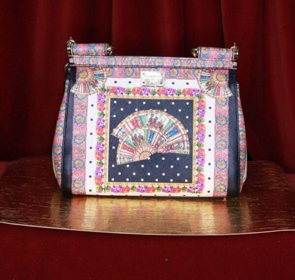 A purse sitting on top of a table.