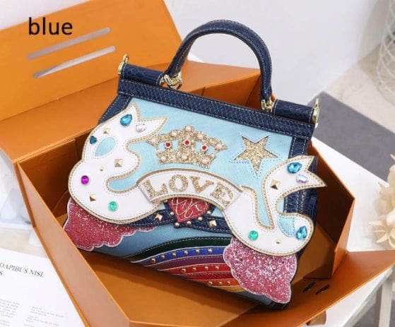 A blue bag with a unicorn design on it