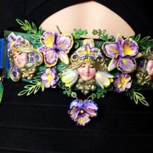 A close up of the head band with flowers