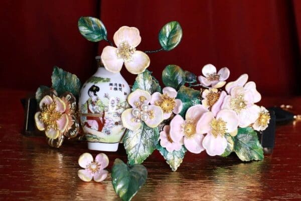 A vase with flowers on the table