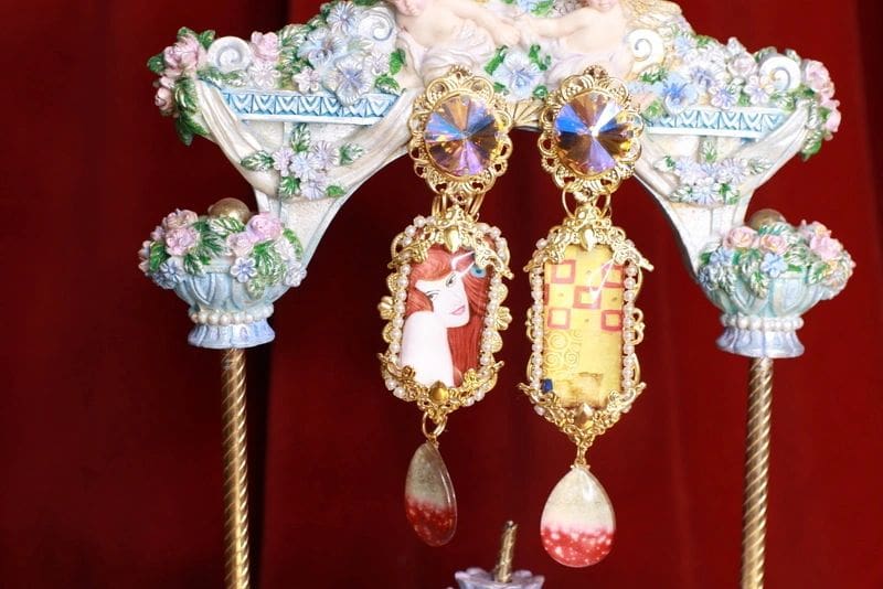 A pair of earrings hanging from the ceiling.