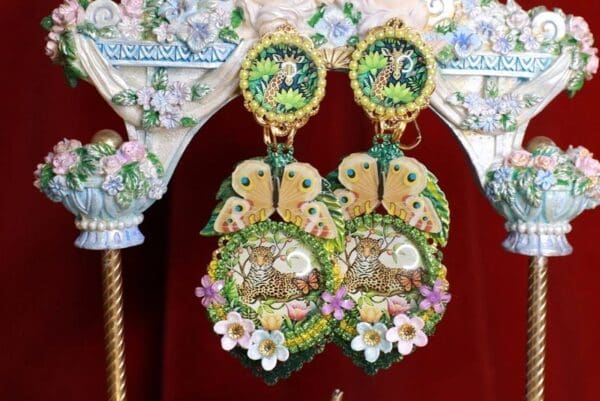 A pair of earrings hanging from the ceiling.