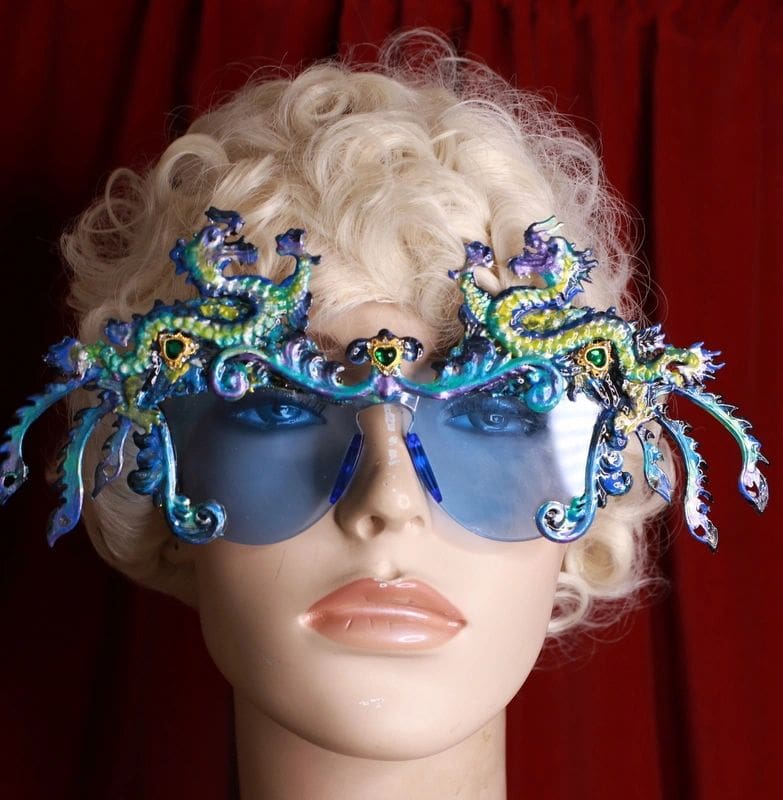 A woman wearing some fancy glasses with sea creatures on them